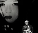 Geisha and saxo player in Madrid